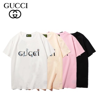 [S-5XL] เสื้อยืดแขนสั้นลําลอง ผ้าฝ้าย พิมพ์ลาย G-u-C-ci เข้ากับทุกการแต่งกาย พลัสไซซ์ สําหรับผู้ชาย และผู้หญิง