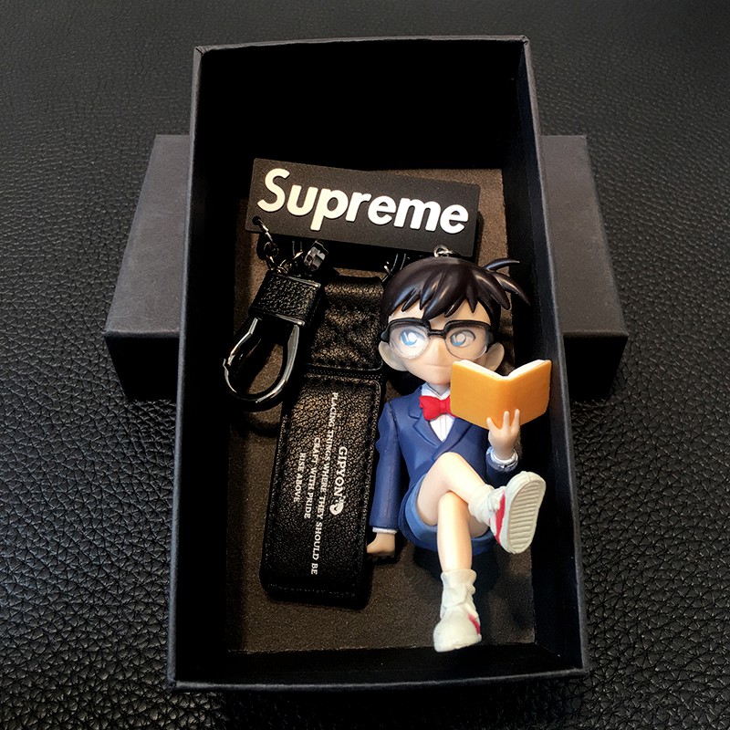 keychain-โคนันนักสืบพวงกุญแจตุ๊กตาโมเดลอุปกรณ์ต่อพ่วงคุโด้ชินอิจิกระเป๋านักเรียนจี้พวงกุญแจรถของขวัญ