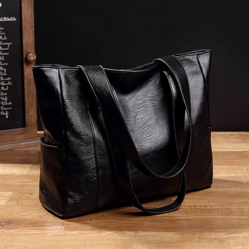 ภาพหน้าปกสินค้าถุงหญิงกระเป๋าป่าใหม่กระเป๋าสะพายกระเป๋าถือกระเป๋าใบใหญ่ที่เรียบง่าย