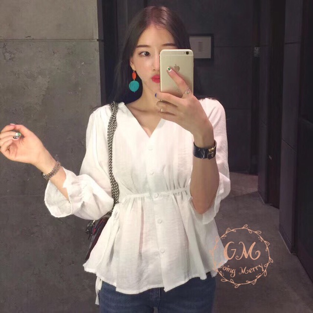 เสื้อคอวีผ่าหน้าติดกระดุม