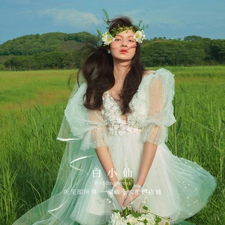 สตูดิโอถ่ายภาพใหม่เดินทางชุดรูปแบบเสื้อผ้าคู่ภาพหวานเจ้าหญิงลมกระโปรงสีขาวชุดแต่งงานหญิง