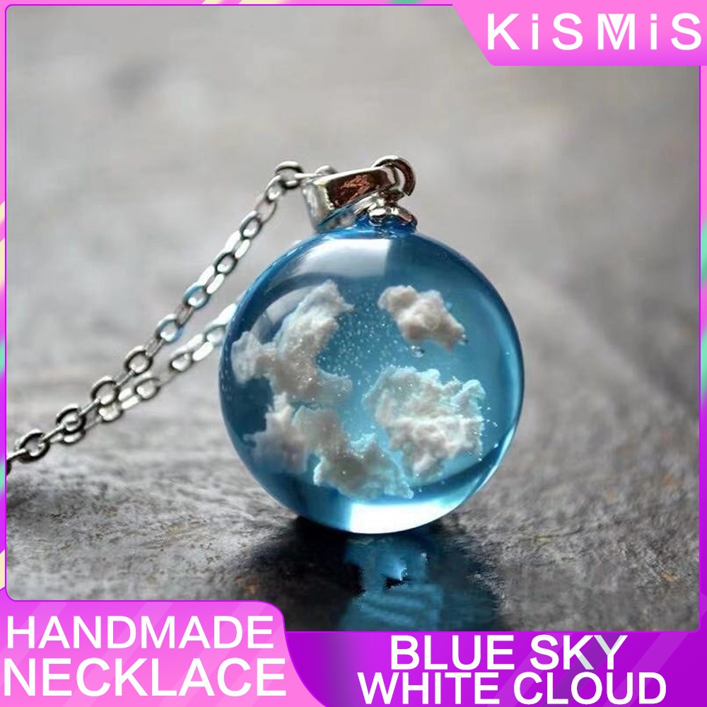 ภาพหน้าปกสินค้าเครื่องประดับ สร้อยคอ จี้เรซิ่น รูปก้อนเมฆ หินโก สีฟ้า และสีขาว แบบสร้างสรรค์