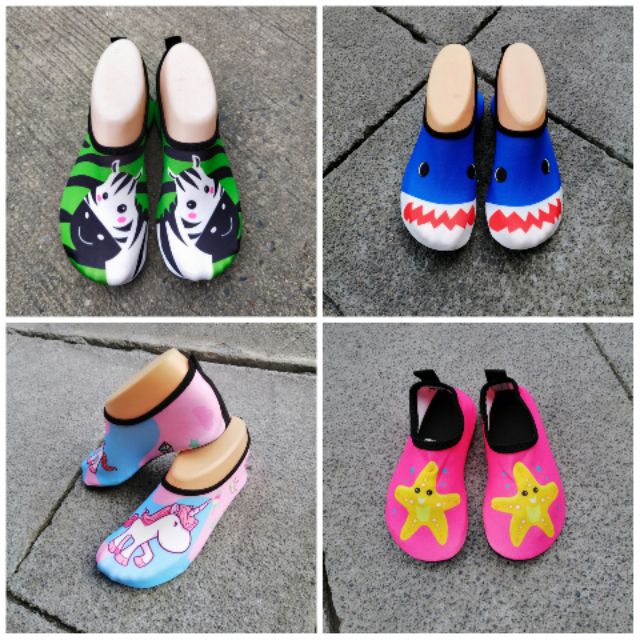 รูปภาพของพร้อมส่ง รองเท้าเดินชายหาดเด็ก Swimming​ ​shoes​ รองเท้าว่ายน้ำเด็ก​ รองเท้ากันลื่นเด็ก​ Aqua skin shoes for kidsลองเช็คราคา