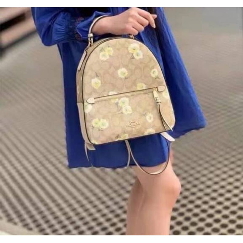 coach-jordyn-backpack-in-signature-canvas-with-prairie-daisy-cluster-print-coach-3054