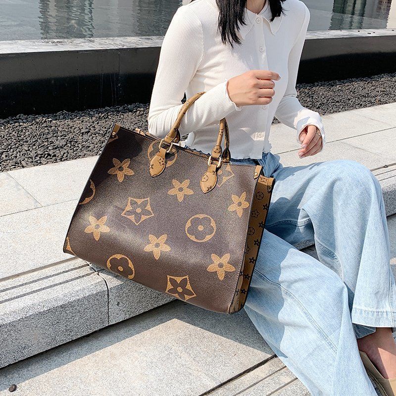 ภาพหน้าปกสินค้าแฟชั่นญี่ปุ่นและเกาหลีผู้หญิงความจุขนาดใหญ่กระเป๋าถือ