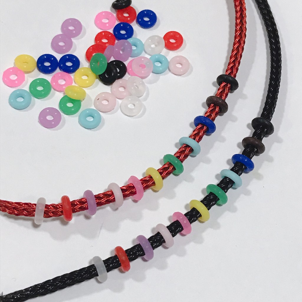 รูปภาพของยางกันชาร์ม ขนาด5-6mm มีหลายสี stopper beadsลองเช็คราคา