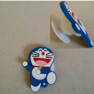 ที่ตั้งโทรศัพท์ หรือ พันสายไฟ ด้านหลังดึงออกมาได้ค่ะ ลาย โดราเอม่อน Doraemon