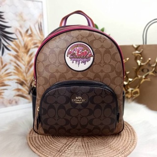 COACH (C6920) COURT BACKPACK IN BLOCKED SIGNATURE CANVAS WITH SOUVENIR PATCHES