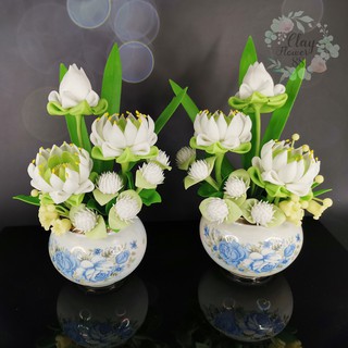 ภาพหน้าปกสินค้าชุดคู่ แจกัน ดอกบัวประดิษฐ์ ดอกไม้ไหว้พระ ดอกบัวปลอม ดอกบัวไหว้พระ ดอกไม้ดินปั้น จาก ดินไทย (สูง 6 นิ้ว) ที่เกี่ยวข้อง