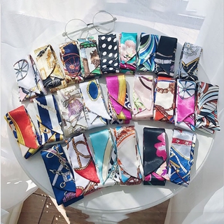 ภาพหน้าปกสินค้า✨สินค้าพร้อมส่ง✨1-19 # Twilly Scarf Ribbon Bag Tied Handle Neck Bow Ties WJ1033 100 Colors with Individual Packaging ซึ่งคุณอาจชอบราคาและรีวิวของสินค้านี้