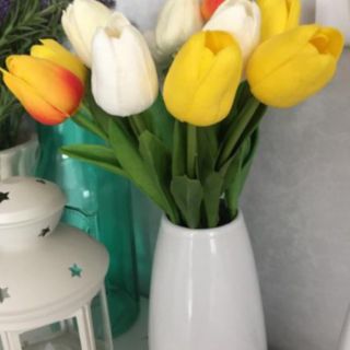 ภาพขนาดย่อของภาพหน้าปกสินค้าแจกัน แจกันเซรามิค  แจกันจัดดอกไม้  แจกันใส่ดอกไม้ ทรงมะละกอ สีขาว มี2ลาย  บรรจุ1ใบ จากร้าน idolbird บน Shopee