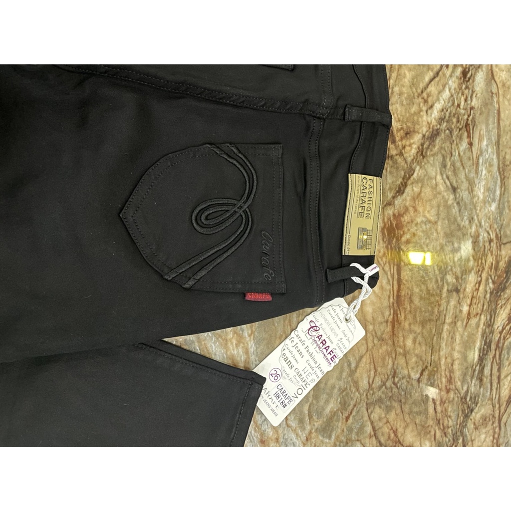 ภาพหน้าปกสินค้ากางเกงยีนส์ CARAFE รุ่น H818 (สีดำ)  กางเกงยีนส์ผู้หญิง กางเกงยีนส์ขายาว ขาเดฟ ผ้านิ่มยืด จากร้าน carafe.store บน Shopee