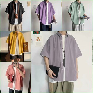 ภาพหน้าปกสินค้า【7 สี】เสื้อเชิ้ตแขนสั้นผู้ชายสีทึบ / แฟชั่นฤดูร้อนเสื้อเชิ้ตหลวมสบาย ๆ สไตล์ฮ่องกง M-2XL ที่เกี่ยวข้อง