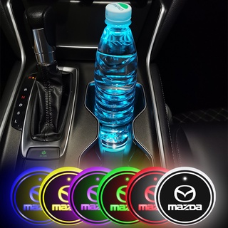 แผ่นรองแก้วน้ํา ลายโลโก้ LED หลากสี สําหรับตกแต่งภายในรถยนต์ Mazda 5 6 323 626 RX8 CX5 CX-4 MX3 MX5 Atenza Axela 2 ชิ้น ต่อชุด