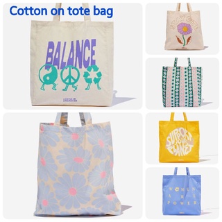 ภาพหน้าปกสินค้าพร้อมส่ง!!🔥กระเป๋าผ้า Cotton on Organic Tote Bag 2022 แท้100% การันตีส่งเร็ว ที่เกี่ยวข้อง