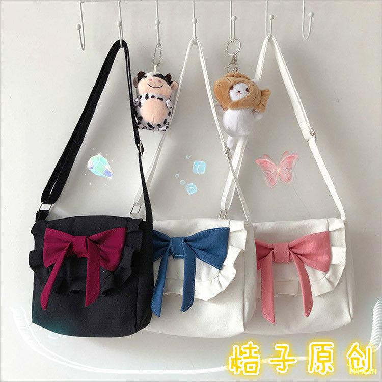 hot-sale-lolita-retro-sweet-bow-soft-girl-canvas-bag-korean-ins-girl-heart-messenger-bag-jk-bag-กระเป๋า