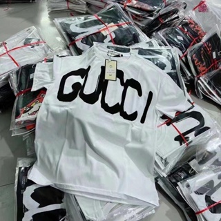 Gucci 23 เสื้อยืดแขนสั้นลําลอง ผ้าฝ้าย พิมพ์ลายตัวอักษร G joint name B สําหรับผู้ชาย