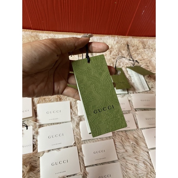 ภาพหน้าปกสินค้าการ์ดGucci book Gucci ป้ายห้อยGucci ป้ายห้อยเสื้อ จากร้าน maturadaimport บน Shopee