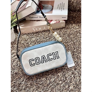 COACH JAMIE WRISTLET IN SIGNATURE CANVAS WITH VARSITY MOTIF