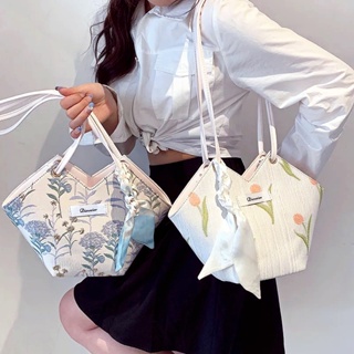 กระเป๋าความจุขนาดใหญ่ของผู้หญิง 2022 กระเป๋าโท้ทเวอร์ชั่นเกาหลียอดนิยมใหม่ กระเป๋าปักลายผู้หญิง