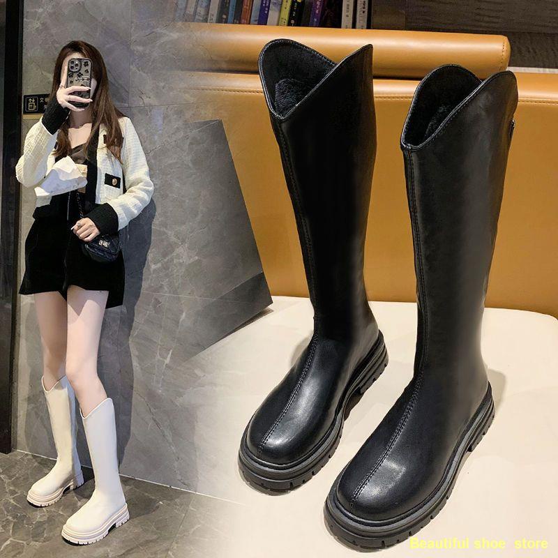 ภาพหน้าปกสินค้าSpot  รองเท้าบูทสูงสตรีสไตล์เกาหลีใหม่รองเท้าบูทยาวซิปหลังรองเท้าบางรองเท้ากลาง