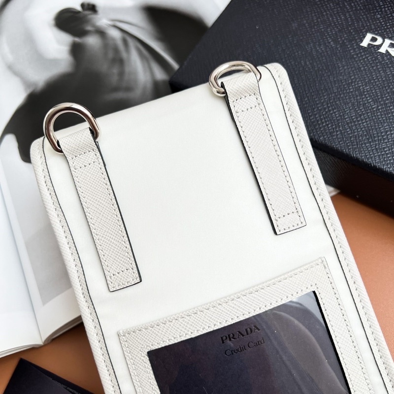 Milan, Italy - September, 21, 2022: Stylish Woman Wearing Re-Nylon and Saffiano  Leather Smartphone Case from Prada Editorial Image - Image of blogger,  street: 260318810