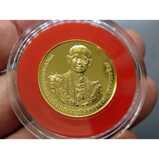 เหรียญทองคำ (ทอง 99 % หนัก 20 กรัม) ที่ระลึกพิธีถวาย พระ เพลิง รัชกาลที่9 พ.ศ.2560 พร้อมกล่องใบเซอร์