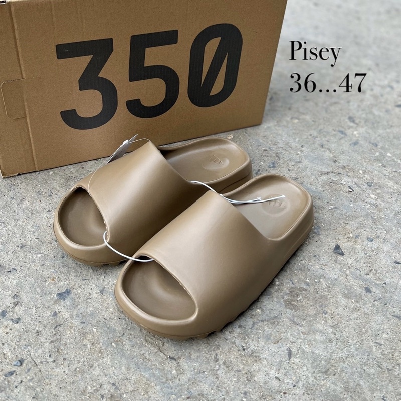 ภาพหน้าปกสินค้ารองเท้าแตะ Yeezy slide สีน้ำตาลอ่อนเ 3647 บา นุ่ม ใส่สบาย พร้อมกล่อง สินค้ามีพร้อมส่งในไทย จากร้าน kuntheayem บน Shopee