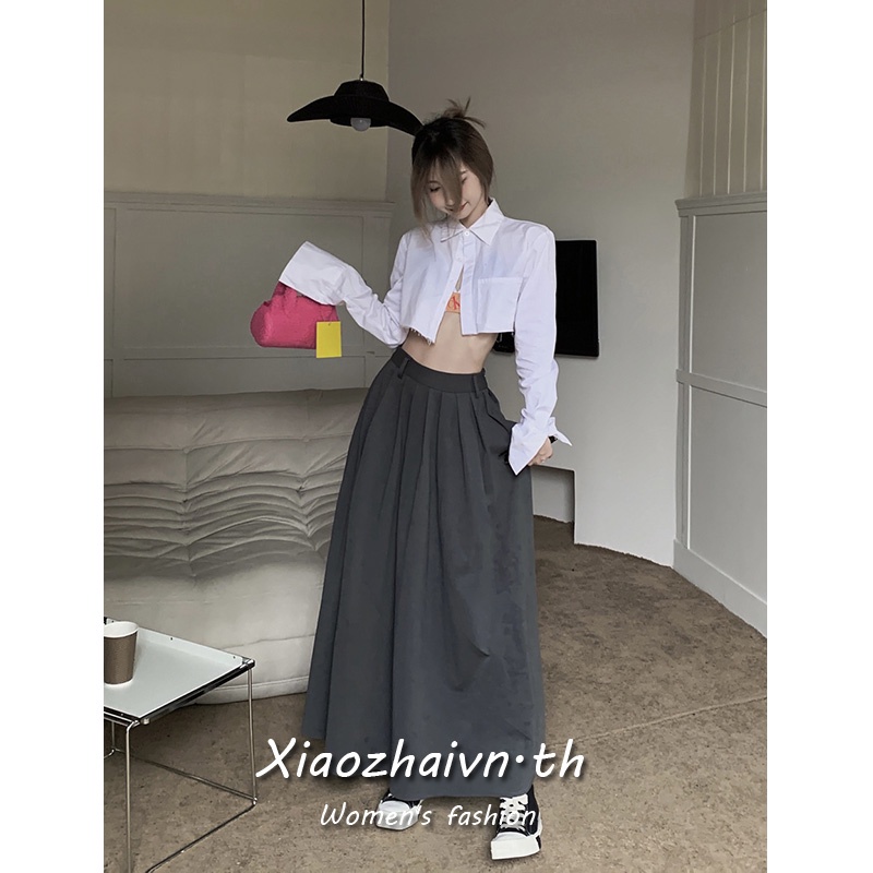 ภาพหน้าปกสินค้าXiaozhainv เวอร์ชั่นเกาหลี เทรนด์แฟชั่น เสื้อผ้าผู้หญิง สีพื้น เรียบง่าย ครอป เสื้อแขนยาว / กระโปรงกลาง ลําลอง ชุดสองชิ้นตัวเลือกแยกต่างหาก