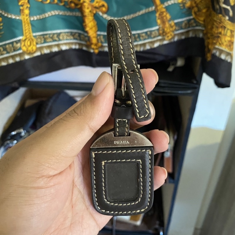 Prada name cheap tag