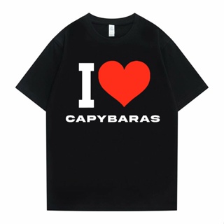 เสื้อยืดแขนสั้น ฉันรัก Capybaras กราฟิกพิมพ์ Tshirt ผู้ชายผู้หญิงลําลองหลวมเสื้อยืดผู้ชายขนาดใหญ่เสื้อยืดตลกแขนสั้น Unis