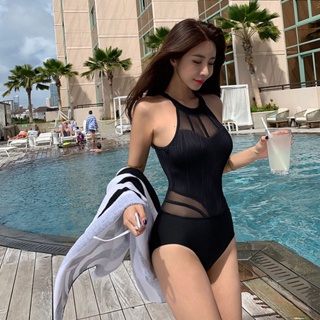 ภาพหน้าปกสินค้าชุดว่ายน้ำเกาหลีอิน ผู้หญิงเซ็กซี่ปกปิดหน้าท้องบาง ชุดว่ายน้ำอกใหญ่ทรงกลวง ชุดว่ายน้ำวันพีชสีดำ ที่เกี่ยวข้อง