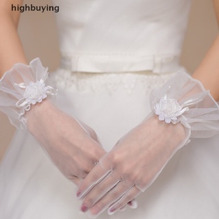 ภาพหน้าปกสินค้า[highbuying] ถุงมือเจ้าสาวแต่งงานลูกไม้ดอกเบญจมาศสีขาวขนาดเล็กถุงมือตาข่ายสั้นหุ้นใหม่ ที่เกี่ยวข้อง