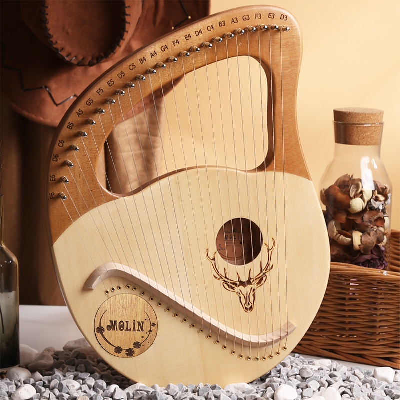 ภาพหน้าปกสินค้าlyre 24-string beginner lyre 24-string harp lyre small portable musical instrument easy to learn จากร้าน ensoullove.th บน Shopee