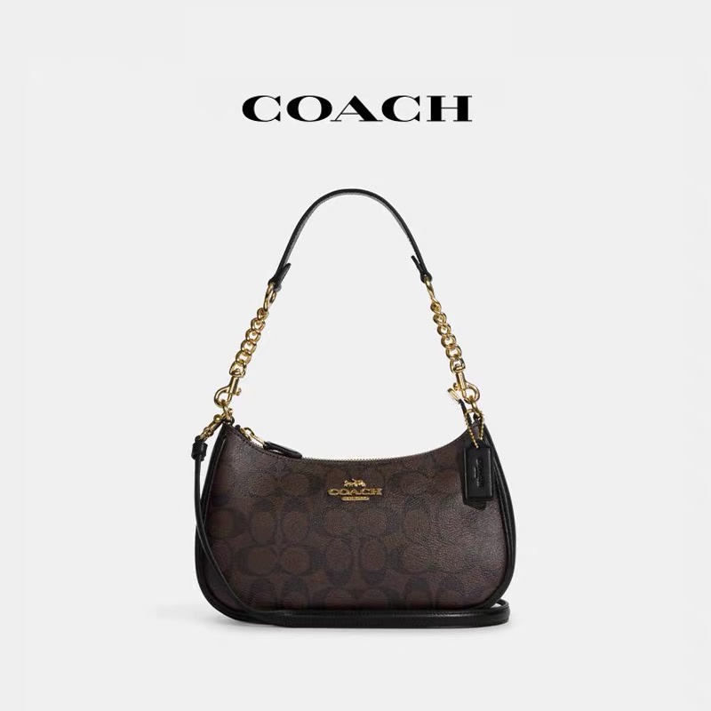 ภาพหน้าปกสินค้าสินค้าใหม่ ข้อเสนอ COACH แท้ 100 เปอร์เซ็น กระเป๋าใต้วงแขนผู้หญิง กระเป๋าสะพาย กระเป๋าสะพายข้า