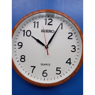 นาฬิกาแขวนผนัง ยี่ห้อ SIEROใช้ถ่านขนาดAA รุ่นSR-020(DW) ขอบน้ำตาลอ่อนลายไม้ ขนาด12นิ้ว รูปภาพจากของจริง ราคาพร้อมถ่าน