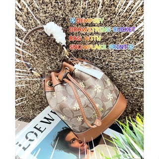 Coach Dempsey Drawstring Bucket Bag In Signature Canvas With Snowflake Print((CE587)