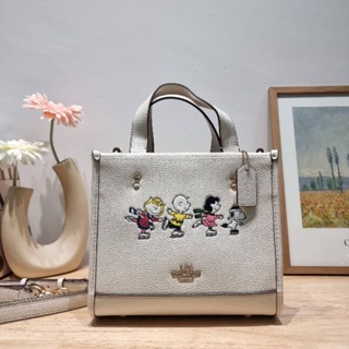 COACH x PEANUTS DEMPSEY TOTE 22 WITH SNOOPY AND FRIENDS MOTIF