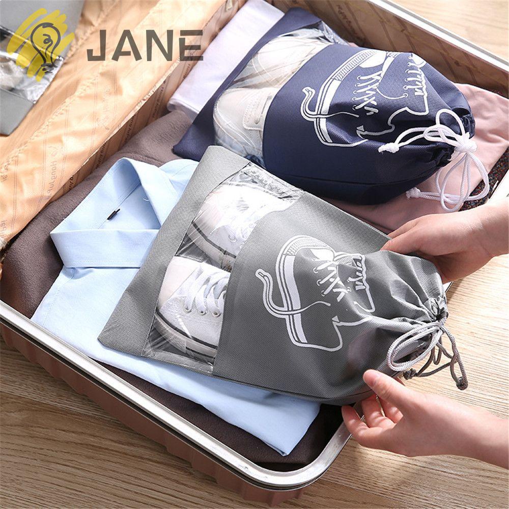 ภาพหน้าปกสินค้าJANE 1/5pcs Travel Storage Pouch Portable Drawstring Shoes Bag Non-woven organizer Useful Carry Sack Home Protector Container/Multicolor