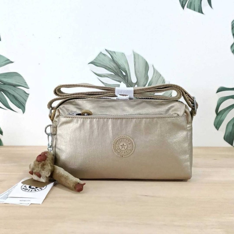 kipling-monkey-program-k16217-seoul-up-sling-bag-รุ่น-3-ซิป