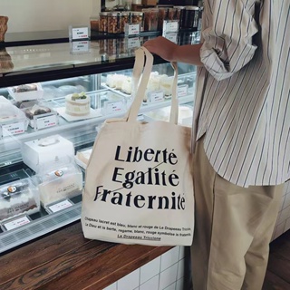 กระเป๋า​ผ้าแคนวาสแฟชั่นสไตล์​เกาหลี​สุดฮิต Liberte egalite fraternite
