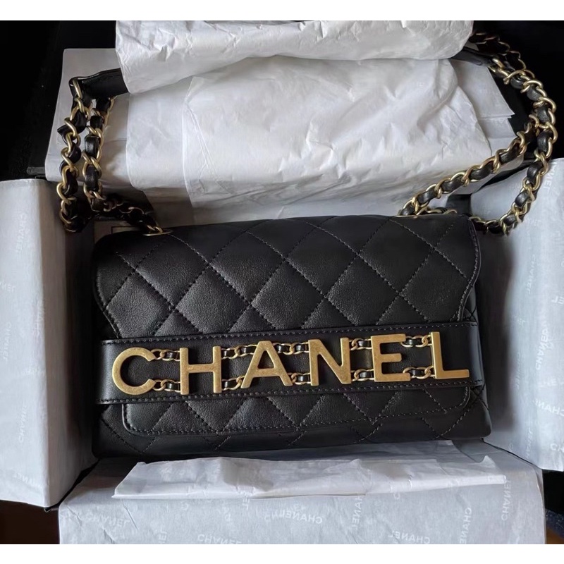 chanel-logo-flap-bag-black