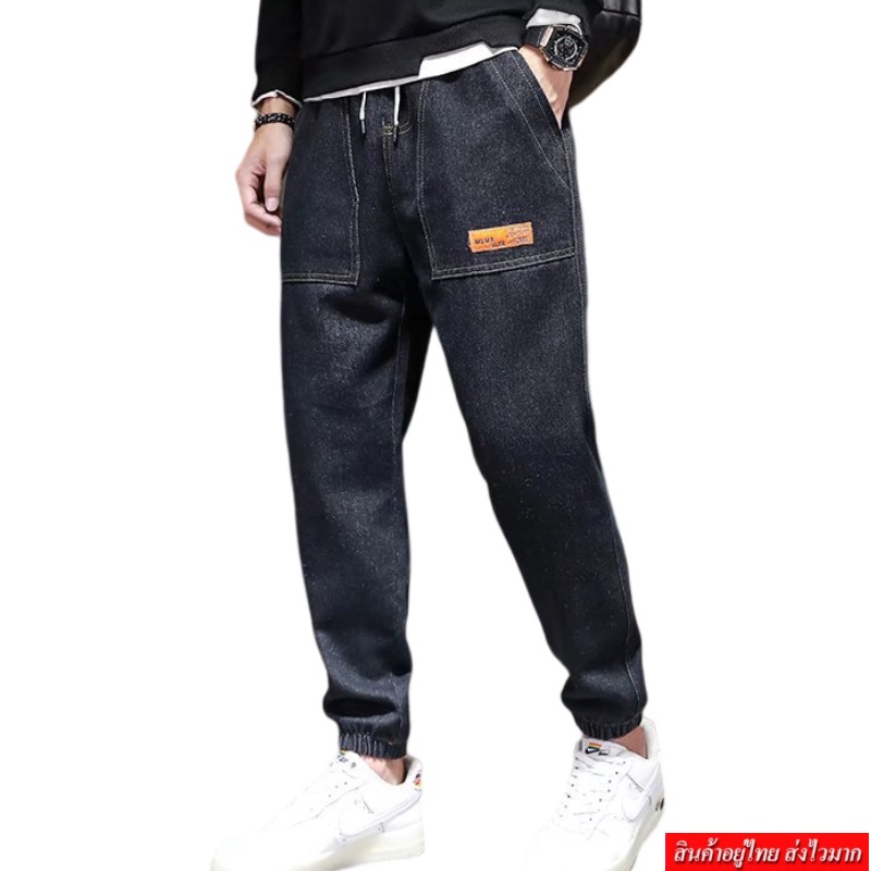 ภาพหน้าปกสินค้าLeoman กางเกงยีนส์ขายาวผู้ชายเอวยางยืดขาจั้ม ผ้ายีนส์นิ่ม รุ่น M0041