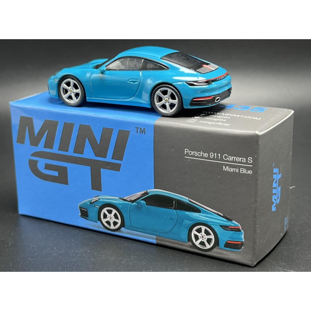 mini-gt-porsche-911-992-carrera-s-miami-blue