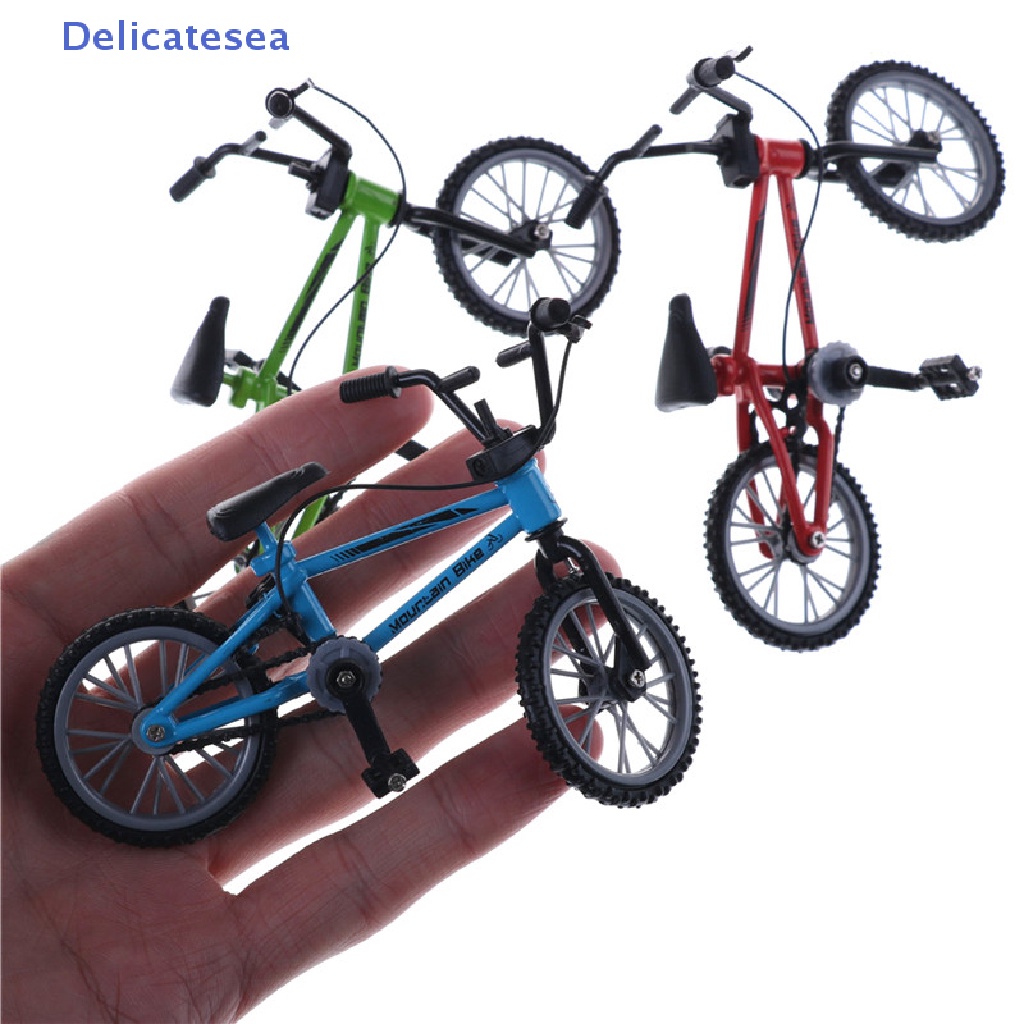 ภาพหน้าปกสินค้ารถจักรยานเสือภูเขา อัลลอย ขนาดเล็ก สร้างสรรค์ ของเล่น สําหรับเด็ก ของขวัญ จากร้าน delicatesea.th บน Shopee