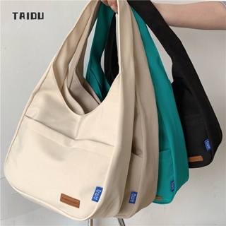 TAIDU กระเป๋าสะพายข้างผู้ชาย สไตล์เกาหลี กระเป๋าสะพายสีทึบ แฟชั่นที่เรียบง่าย ความจุขนาดใหญ่ กระเป๋านักเรียน