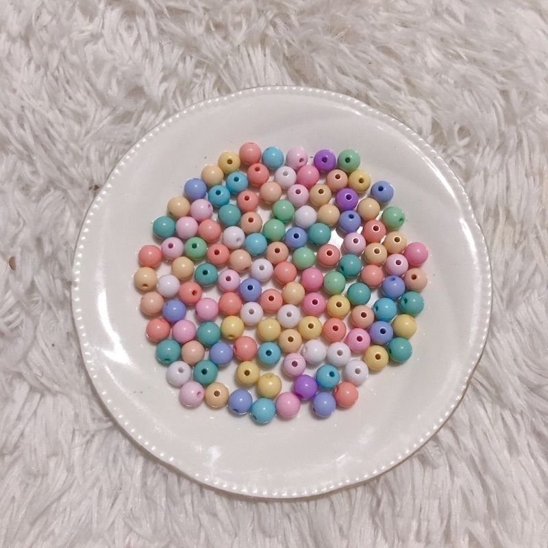 ลูกปัดกลมสีพาสเทลหลากหลายขนาด
