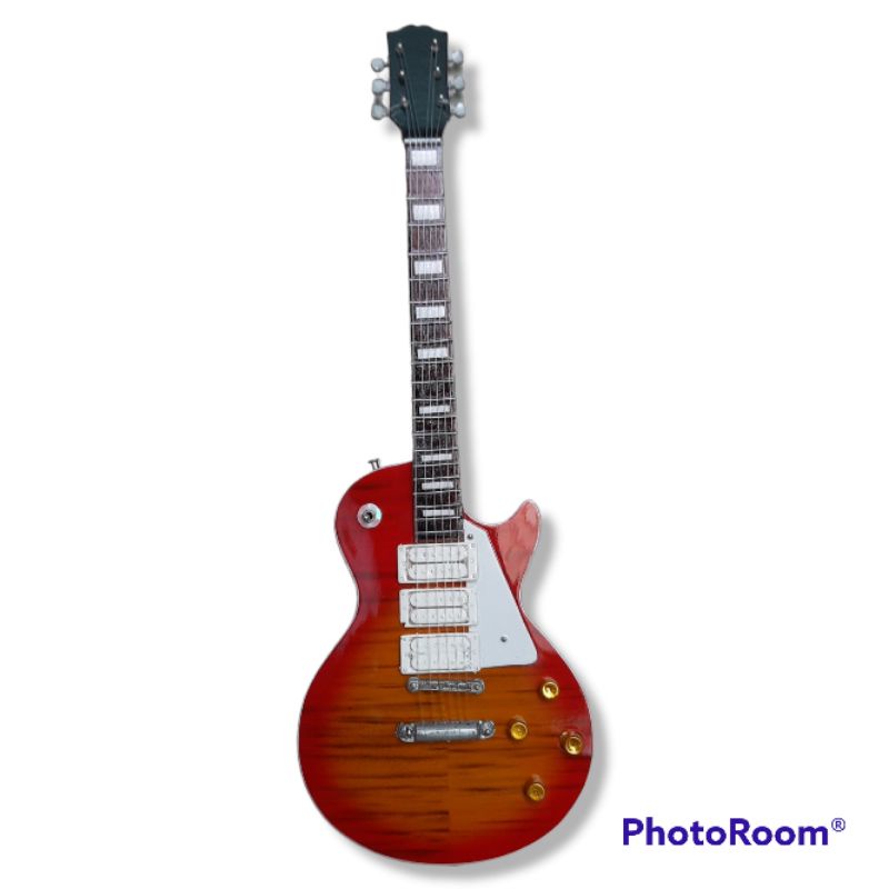 ภาพหน้าปกสินค้าGibson lespaul กีตาร์จิ๋ว พร้อมขาตั้ง