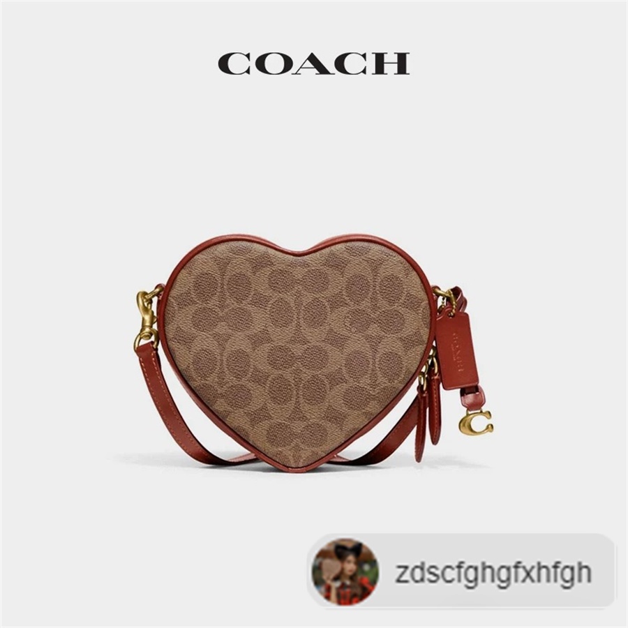 ภาพหน้าปกสินค้าCOACH/Coach Ms. Classic Logo Canvas HEART Messenger Bag/CE726/Love Bag/100% Authentic จากร้าน dfgjfgdh บน Shopee