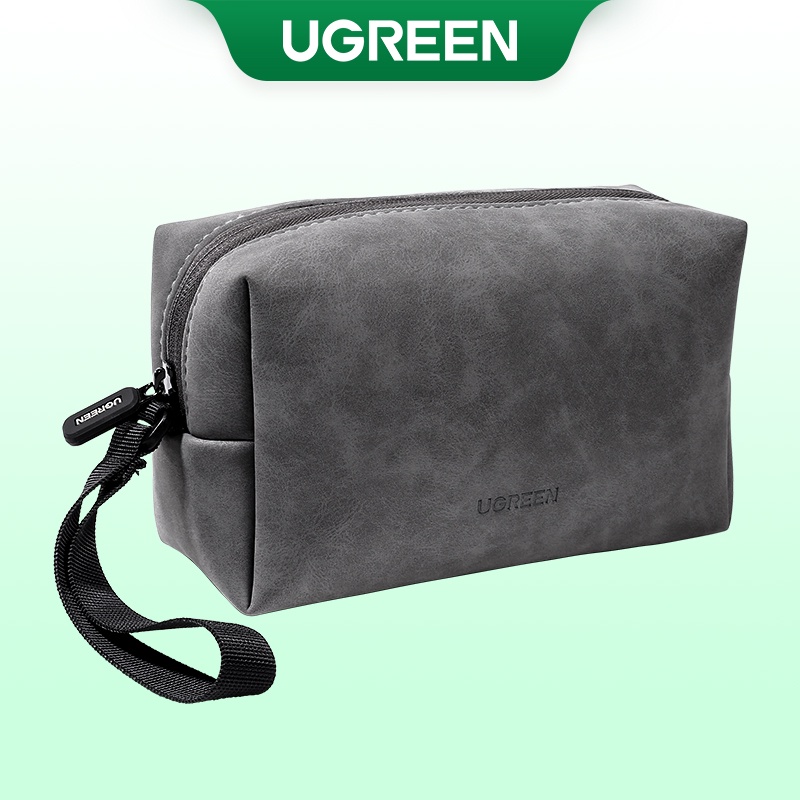 ภาพหน้าปกสินค้าUGREEN กระเป๋าหนัง สำหรับจัดเก็บสายเคเบิล หูฟัง อุปกรณ์เสริมมือถือ Storage Bag